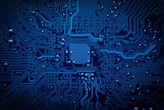 Circuit board blue background blue - a blue light in the middle of it free wallpaper