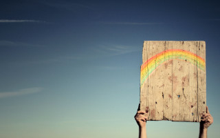 Person holding wooden sign rainbow - vivid free wallpaper