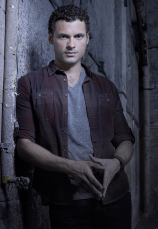 Man dark room hands pockets - promotional image free wallpaper