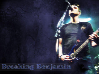 Man holding guitar singing into - ben thompson free wallpaper