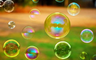 Soap bubbles floating green lawn - a green lawn free wallpaper