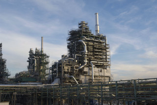 Industrial plant sky background clouds - a building in the foreground free wallpaper