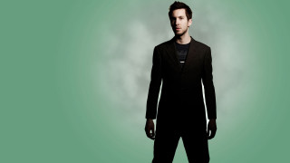 Man black suit green clouds - dan smith free wallpaper