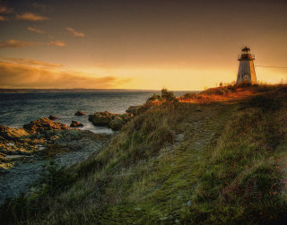 Lighthouse cliff ocean sunset sunrise - sunset over the ocean free wallpaper