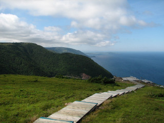 Wooden path grassy hill ocean - a wooden path free wallpaper