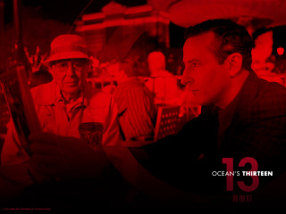 Man holding drink red background - a drink in front free wallpaper