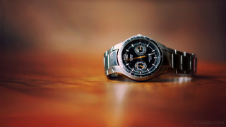 Watch table blurry foreground background - a watch free wallpaper