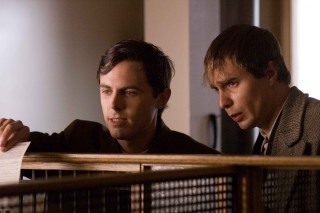 Two men looking caged area - les automatiste free wallpaper