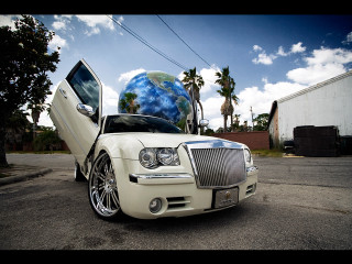 White car globe hood parked - a globe free wallpaper