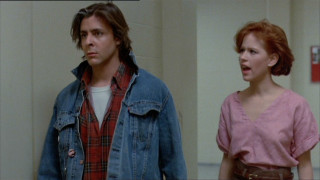 Man woman standing room door - a wall behind them free wallpaper