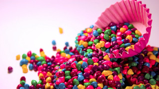 Colorful candy sprinkles white surface 3 - pastel free wallpaper for desktop