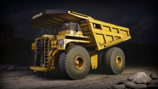 Large yellow dump truck night - hard surface free wallpaper