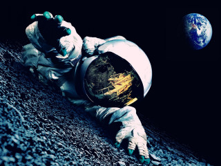 Astronaut laying earth blue planet - the earth free wallpaper