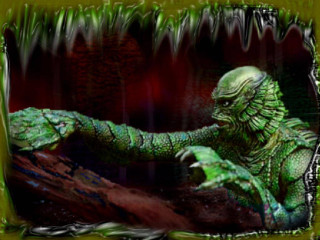Green creature black face outstretched - a green creature free wallpaper