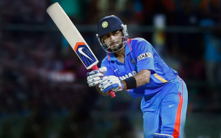 Man holding bat wearing helmet 2 - color scheme free wallpaper