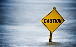Caution sign flooded street black - free retro wallpaper for desktop
