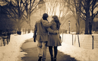 Man woman walking snowy path 2 - a man and woman free wallpaper