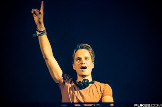 Man headphones hand up air - headphone free wallpaper