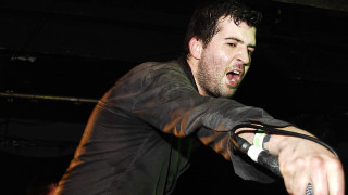 Man holding remote screaming air - a dark room free wallpaper