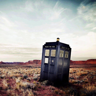 Black phone booth desert sky - free retro wallpaper for tablet