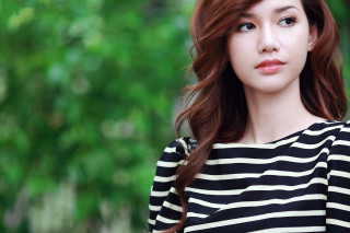 Woman striped shirt green tree - a green tree free wallpaper