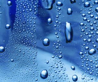 Water droplets blue surface sky 3 - a blue surface free wallpaper