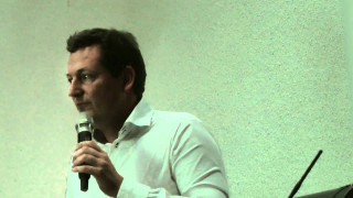 Man holding microphone stand speaker - a speaker free wallpaper