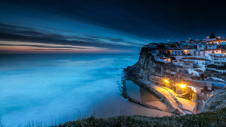City cliff ocean night lights 2 - a cliff free wallpaper