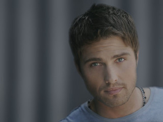 Man blue shirt necklace serious - his neck free wallpaper