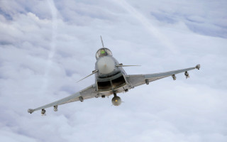 Fighter jet flying above clouds 5 - colin hayes free wallpaper