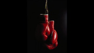 Red boxing gloves hanging rope - a pair free wallpaper