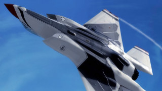 Jet fighter plane blue sky - a jet fighter plane free wallpaper