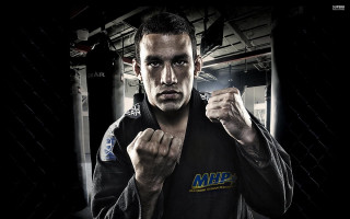Man black shirt posing fists - anthony palumbo free wallpaper