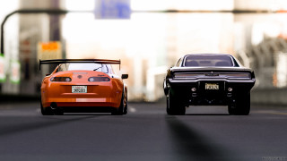 Two cars driving city street - cinematic focus free wallpaper