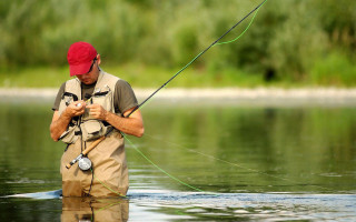Man red hat fishing water - river free wallpaper for desktop