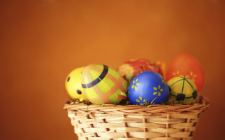 Basket filled colorfully painted eggs - egg free wallpaper
