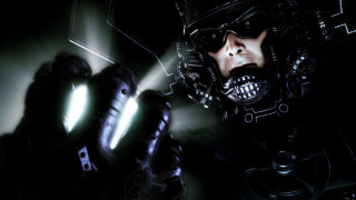 Man helmet light dark room - his hand in free wallpaper