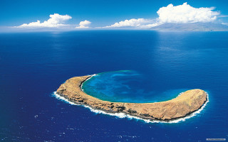 Small island blue hole ocean - a small island in the middle of the ocean free wallpaper