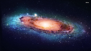 Large galaxy bright orange center - galaxy free wallpaper for desktop