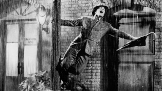 Man suit hat jumping rain - a man in a suit and hat free wallpaper
