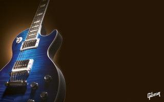Blue guitar black brown background - product photography free wallpaper
