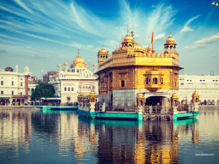Large building lake tall golden - a blue boat free wallpaper