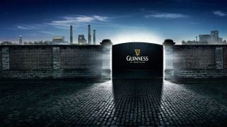 Guinness sign brick wall city - atmosphere free wallpaper
