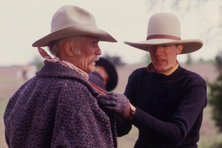 Man woman hats scarves talking - a man and woman free wallpaper