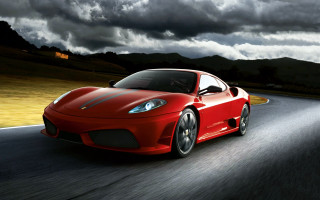 Red sports car cloudy sky 22 - a road under a cloudy sky free wallpaper