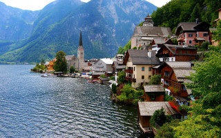 Village lake mountains church shore - a village free wallpaper