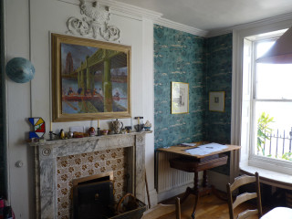 Living room fireplace painting table - a fireplace free wallpaper