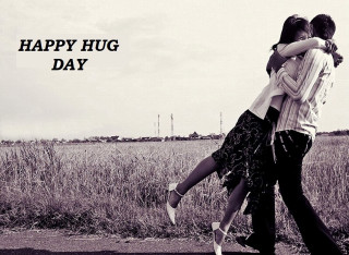 Hugging couple grass field sky - happy free wallpaper for desktop