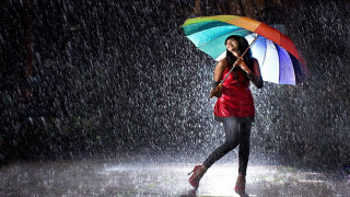 Woman holding umbrella rainbow red - an umbrella in the rain free wallpaper