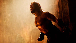 Cave man shirtless light gloves - epic scene free wallpaper